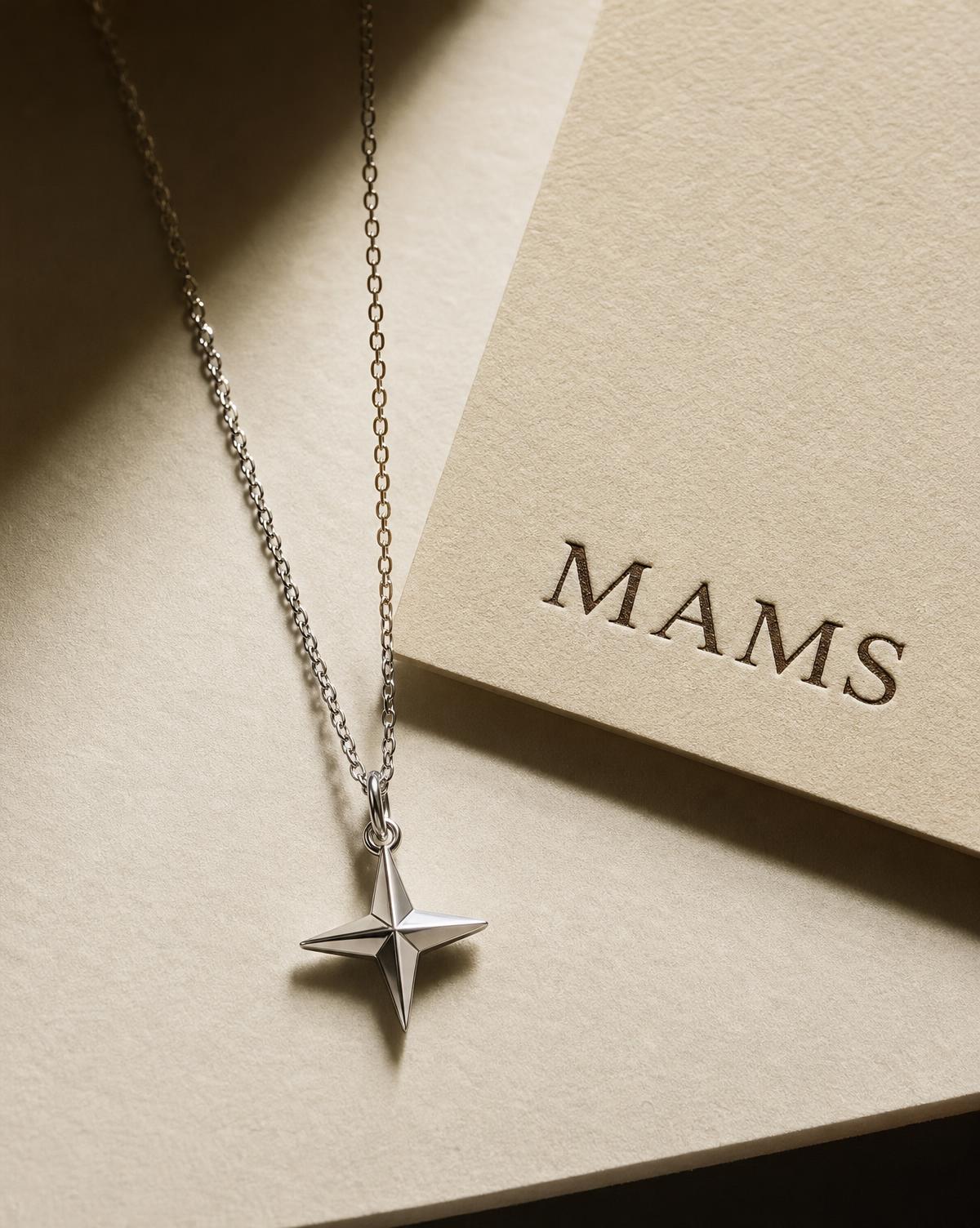 MAMS Signature Star Pendant in 18K white gold with pave-set diamonds, on a fine chain