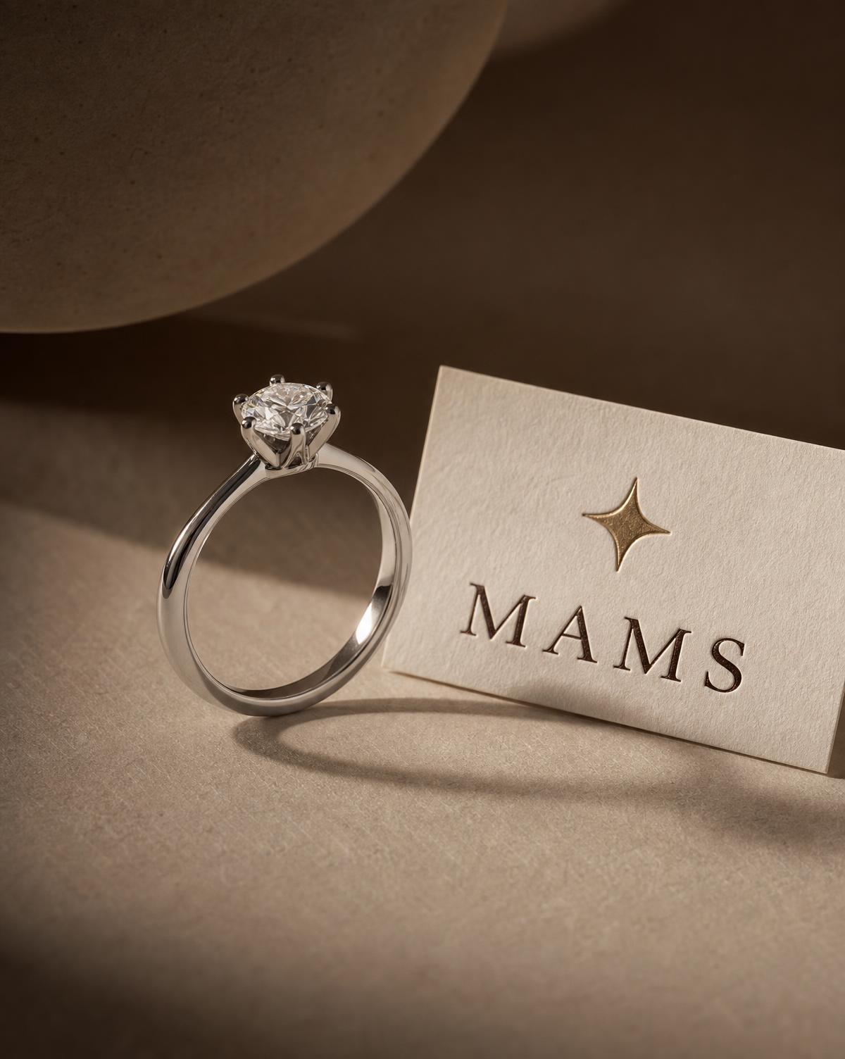 MAMS Atelier Solitaire Ring in 18K white gold, a single brilliant-cut diamond raised on a knife-edge band