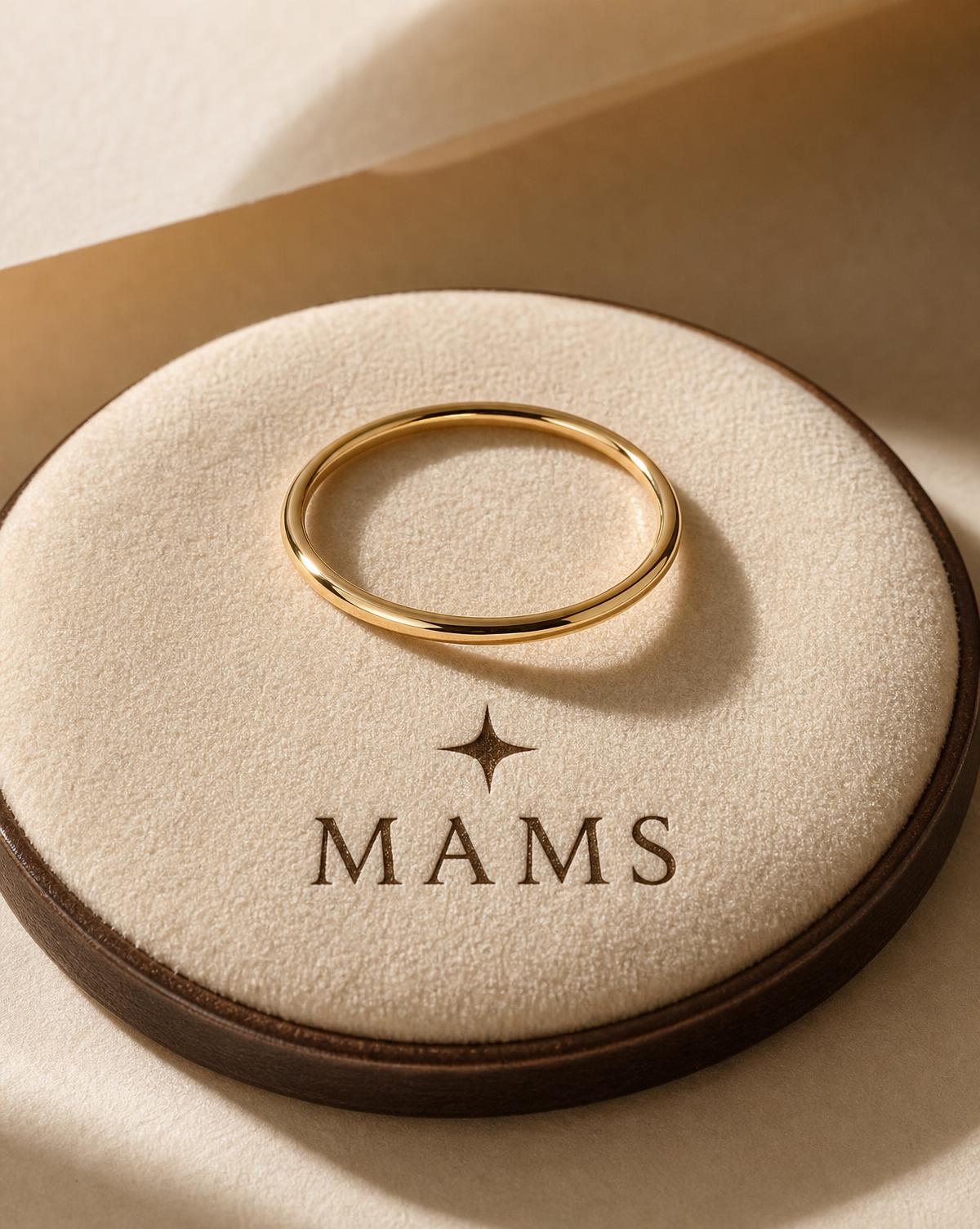 MAMS Aurum Fine Ring, a seamless 18K white gold band on ivory paper